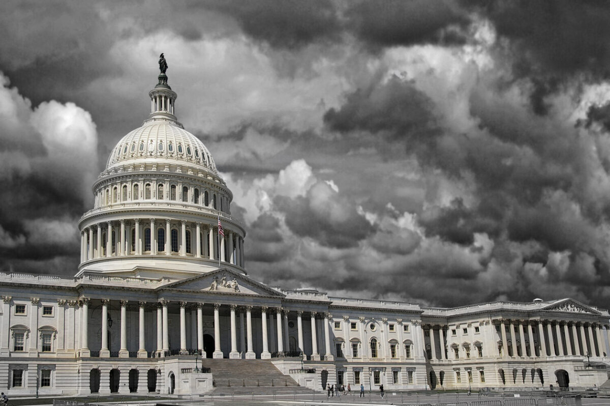 ACA tax credits, stormy clouds over US Capitol building
